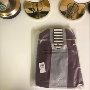 Henri Bendel canvas backpack.